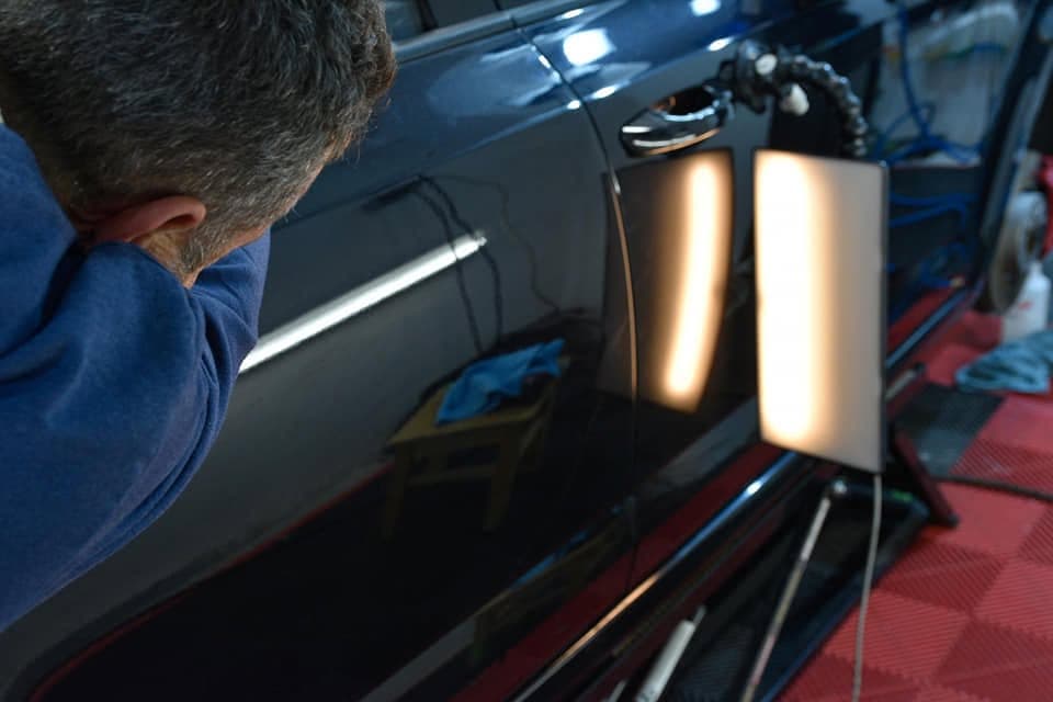 Inspecting paint under the reflector lamp